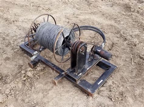 skid steer wire roller|hydraulic skid steer wire winder.